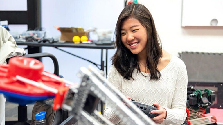 A USC student interacts with gaming technology through an interdisciplinary academic program.