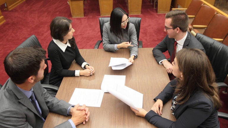 USC Gould School of Law students in a courtroom.