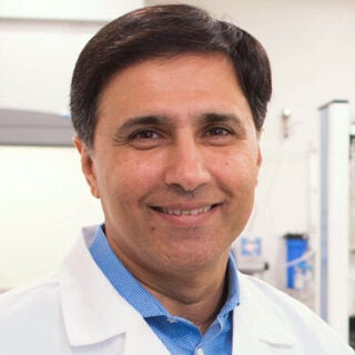 Headshot of faculty member Mark Humayun.