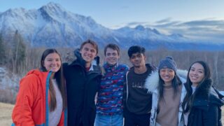 A group of USC Viterbi students posing in Alaska.