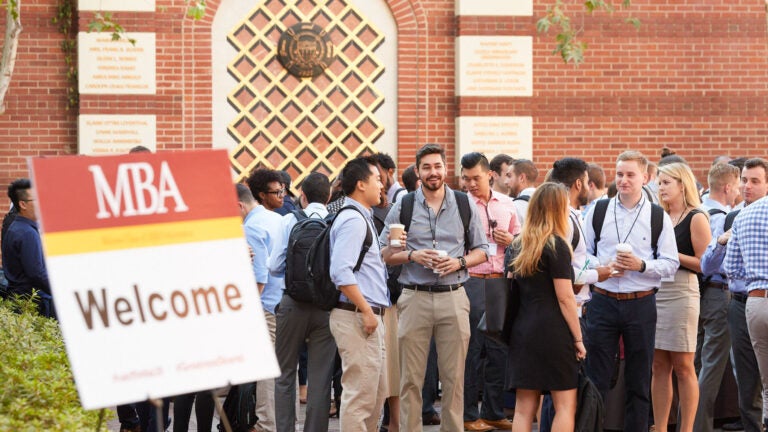 USC Marshall full-time MBA students networking at an event at USC Town & Gown.