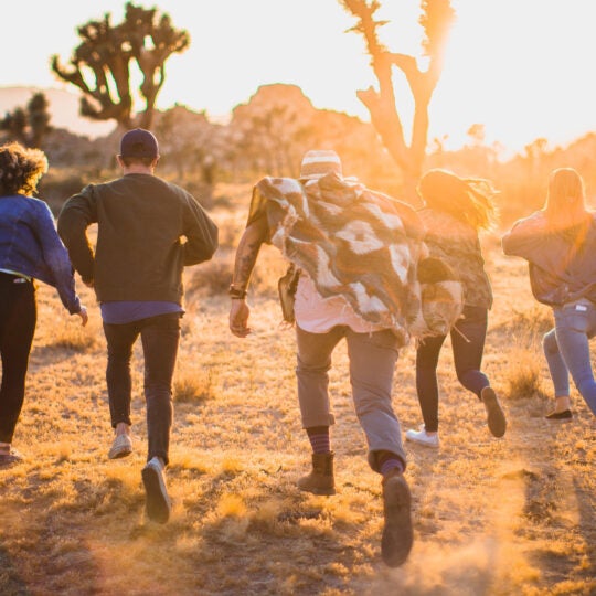 People running at Joshua Tree National Park in the Southern California Desert.