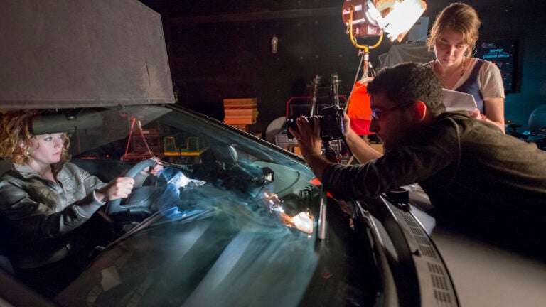 SCA students filming in a studio on campus.