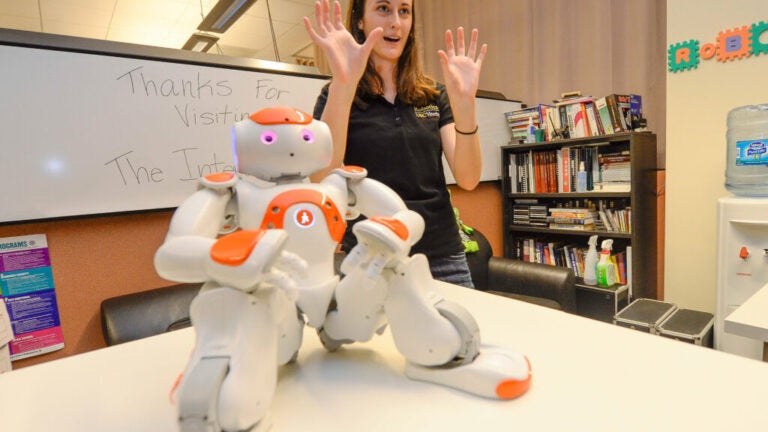 USC Viterbi student with robot