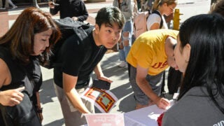 Students sign in during move-day, Aug. 16, 2023. (Photo/Gus Ruelas)