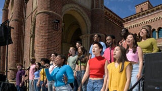 Students sing at ribbon-cutting ceremony
