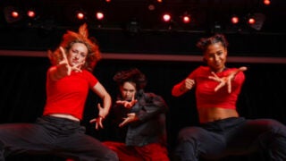 USC dancers wearing red shirts