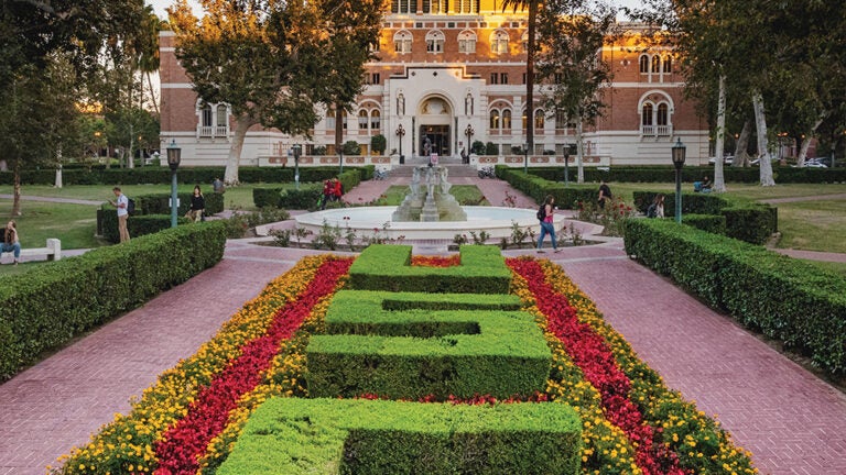 USC Doheney Library with hedges in the shape of the letters USC