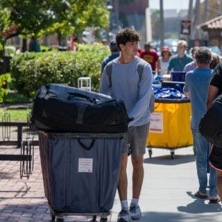 USC fall move-ins: Student with loaded bin