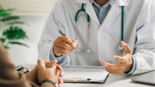 Clinician with patient