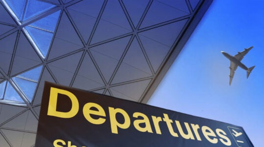 An airplane passing an airport